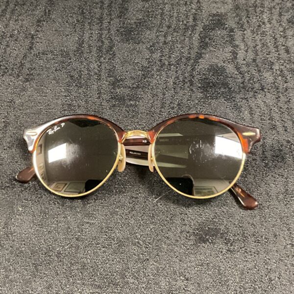 Vintage Ray Ban sunglasses with tortoiseshell frames, front view.