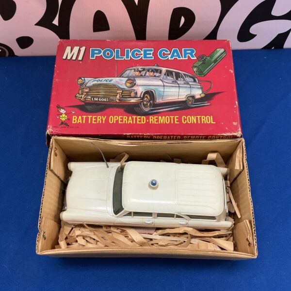 Vintage M1 Police Car, battery operated remote control toy.