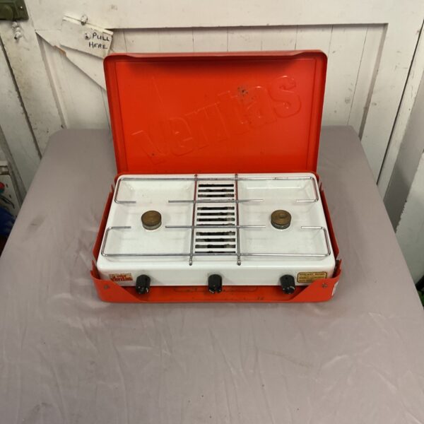 Vintage Romany portable gas camping stove with orange case.