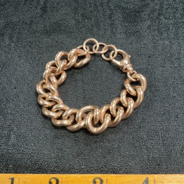 Vintage rose gold plated heavy gauge link bracelet, close-up view.