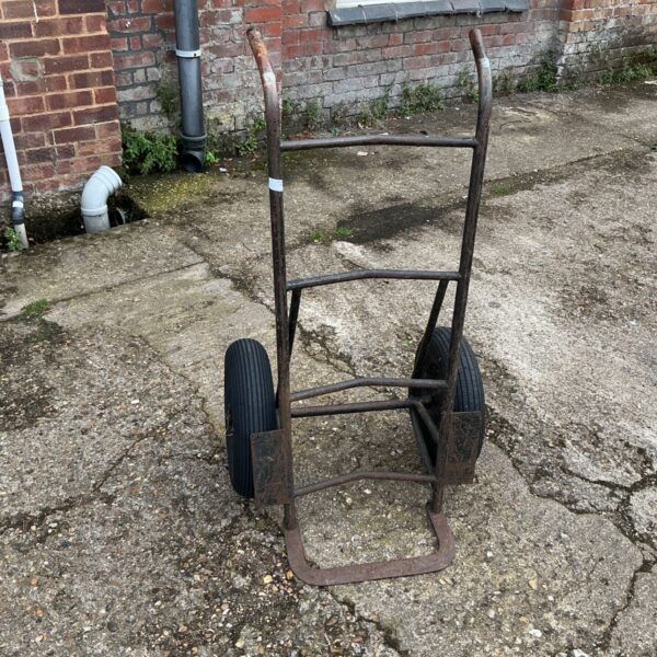Vintage sack barrow with pneumatic tyres, ideal for garden or industrial use.