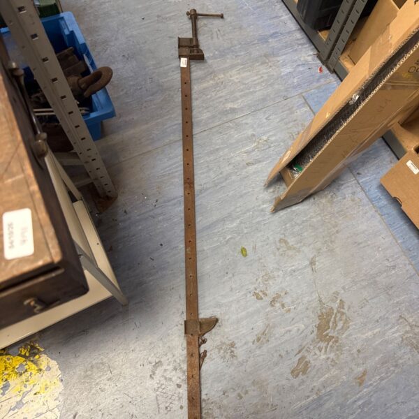 Vintage 48 inch metal sash clamp for woodworking projects.