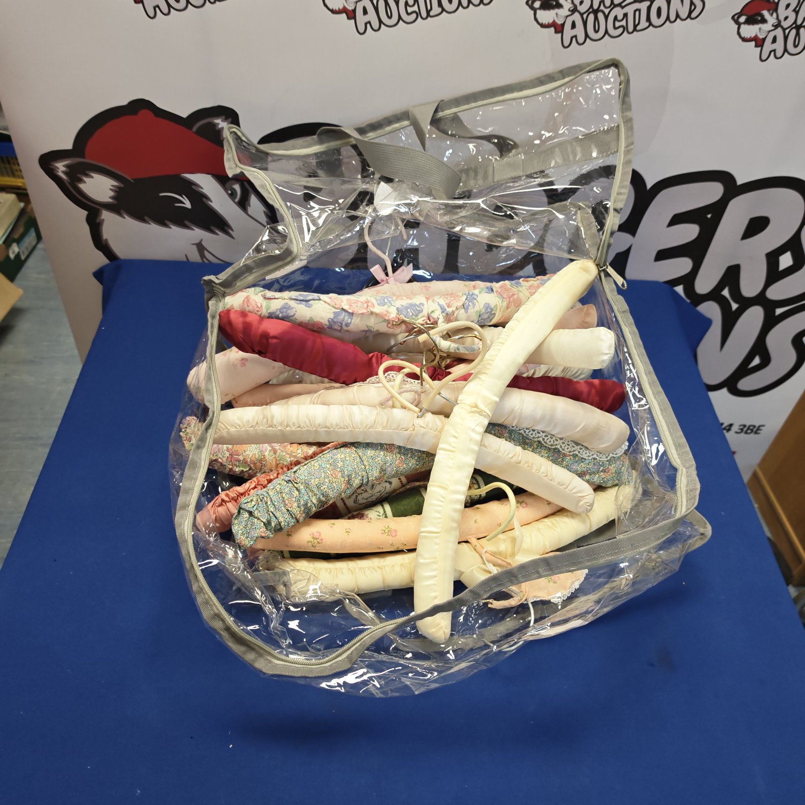 Vintage silk hangers lot for clothing storage.