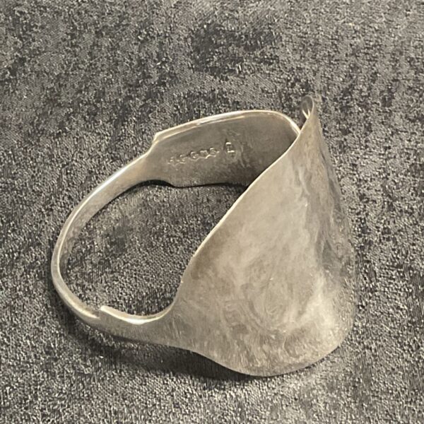 Silver tone vintage spoon cuff bracelet with organic form.