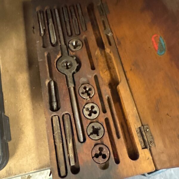 Vintage tap and die set in wooden case, metalworking tools.