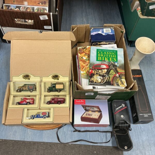 Mixed lot of vintage toy cars and a book on British bikes.