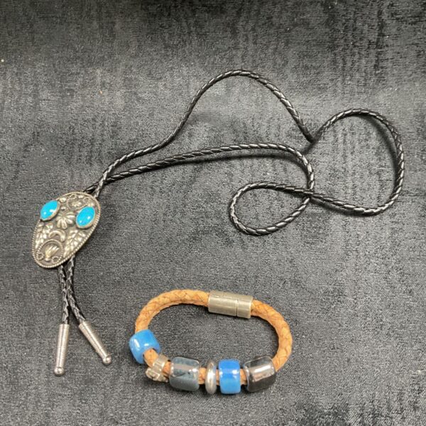 Vintage turquoise cowboy bolo tie and leather bracelet set.