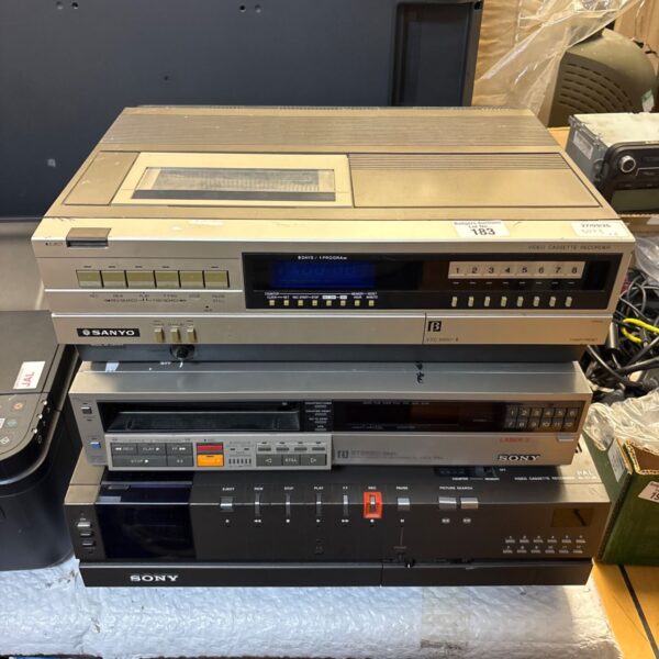 Vintage video cassette recorder lot including Sanyo and Sony VCRs.