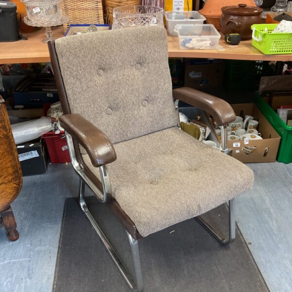 Vintage Verco armchair with tweed upholstery and chrome frame.