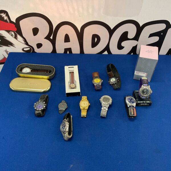 Vintage watch selection including an Animal branded wristwatch.