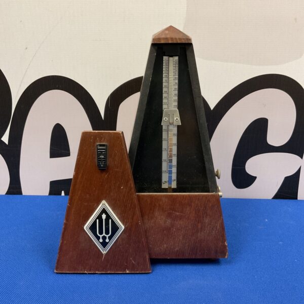 Vintage wooden Willner metronome for musicians and collectors.