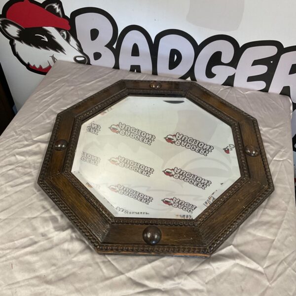 Vintage wooden mirror with a 22 inch surround.