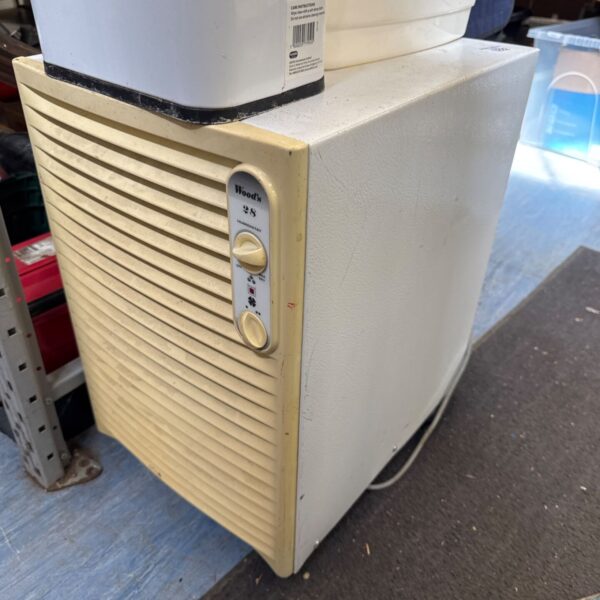Vintage Woods 28 portable dehumidifier, a retro home appliance.