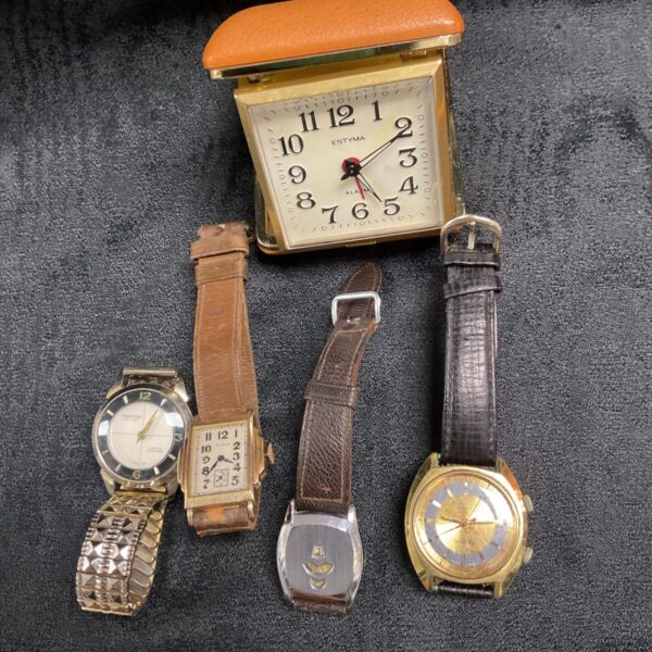 Vintage wristwatches lot with travel alarm parts.