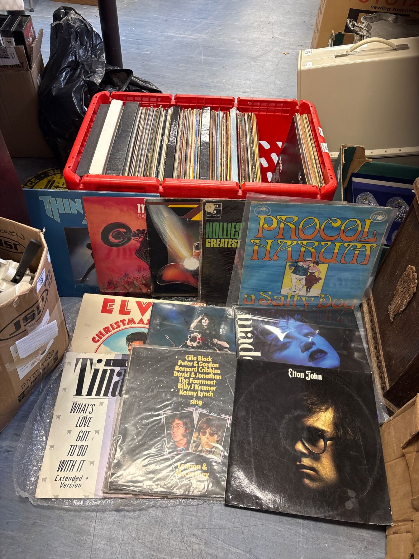 164 Large collection of 12 inch final rock and pop LPs including Thin Lizzy, Meat Loaf, Procol Harum, ZZ top, the Hollies, Madonna, etc