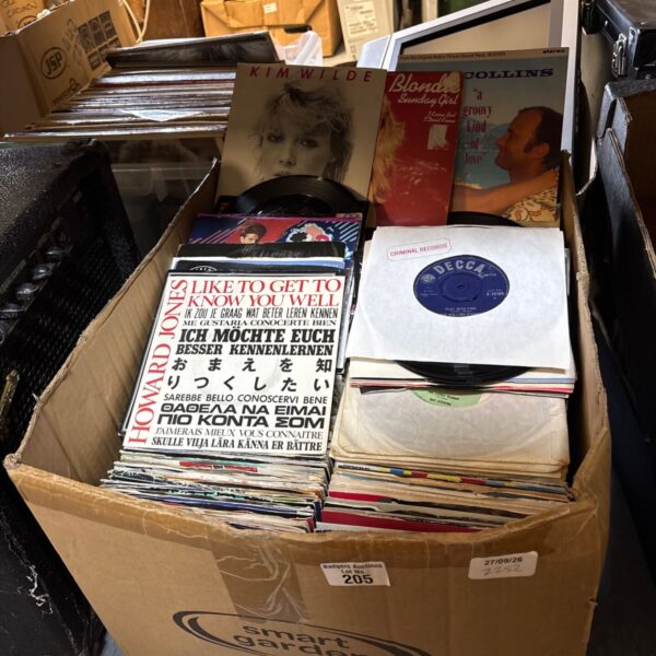 Large collection of 7 inch vinyl records including Blondie and Phil Collins.