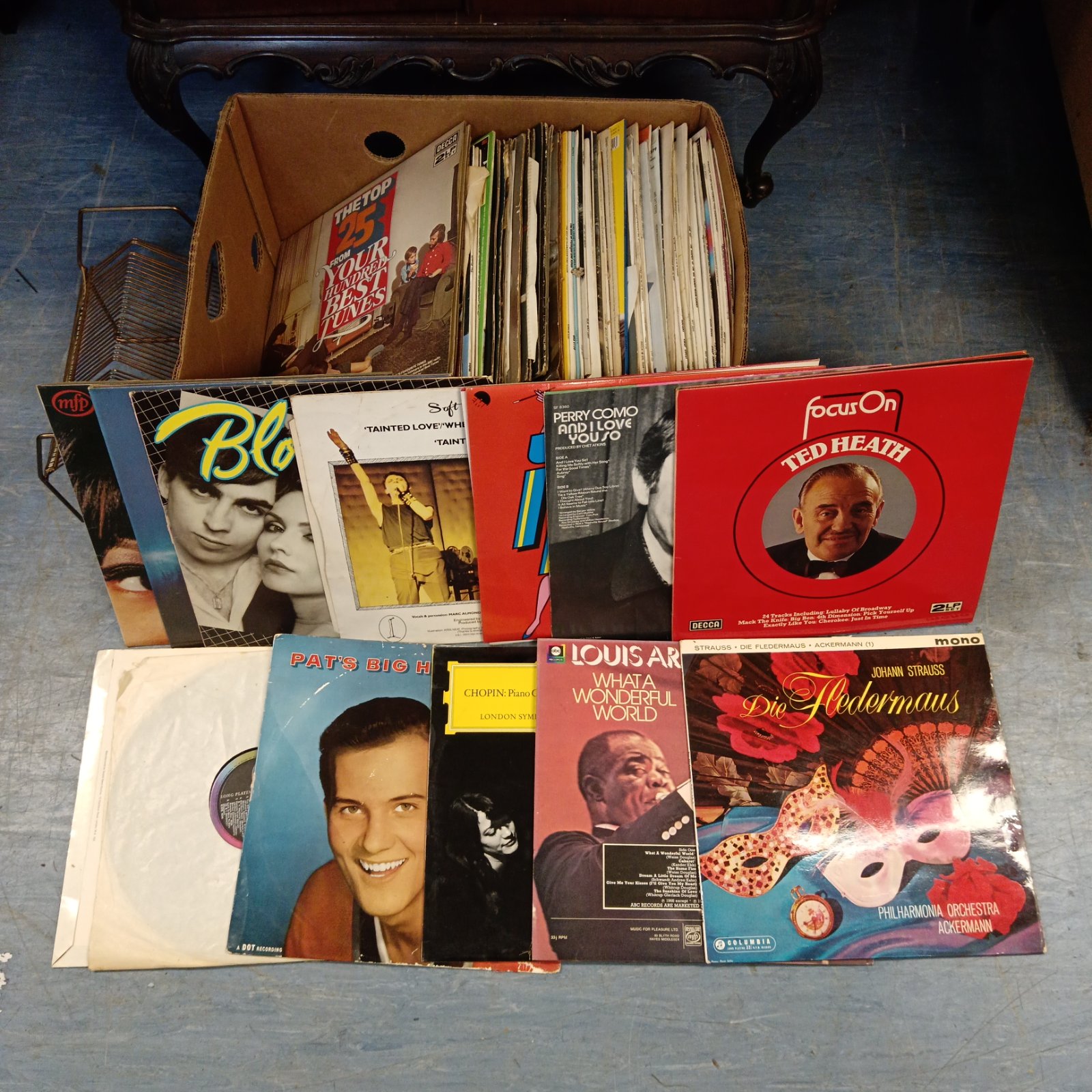 Vintage vinyl record collection with colourful album covers.
