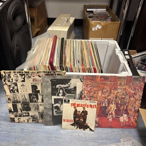 Mixed lot of vintage vinyl records including Rolling Stones and Beatles albums.