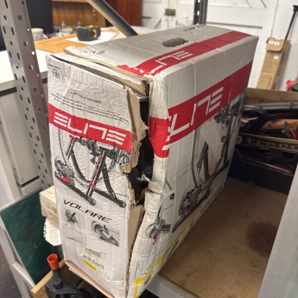 Volare Elite cycle trainer in original packaging, showing signs of wear.