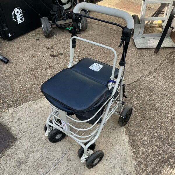 Blue Walk and Rest shopping trolley with a padded seat.