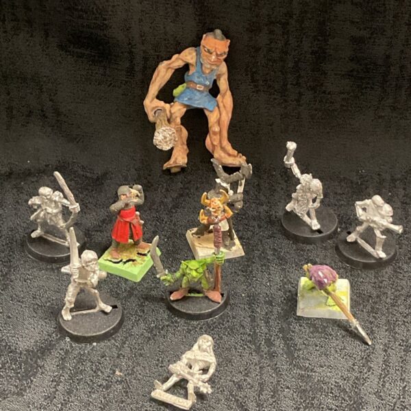 Vintage Warhammer figures from 1985, a collection of lead miniatures.