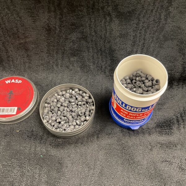 Two tubs of .22 airgun pellets, Wasp and Bulldog brands.