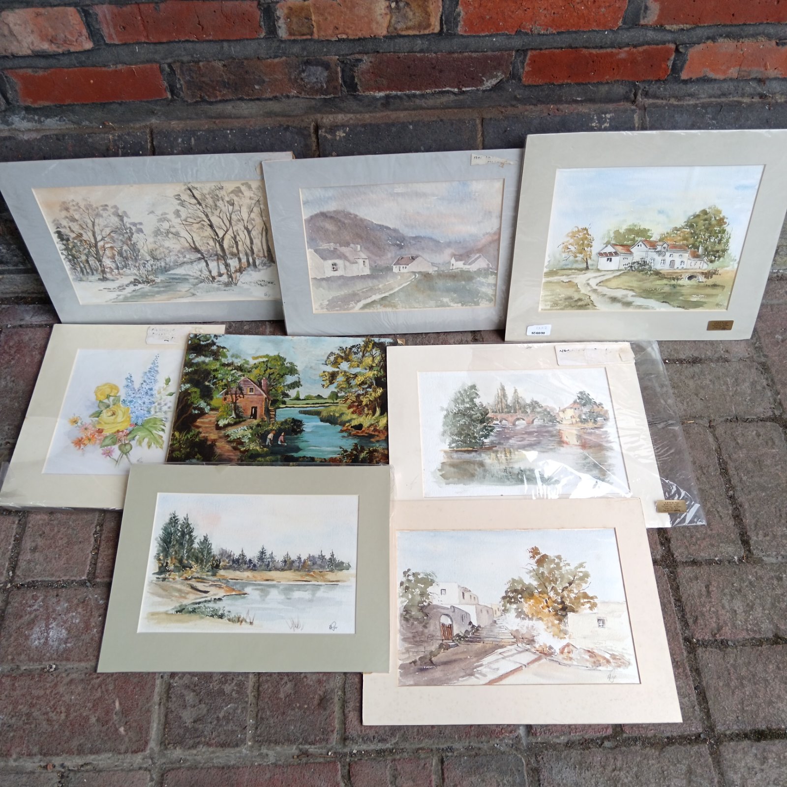 Collection of vintage watercolour paintings depicting countryside scenes.