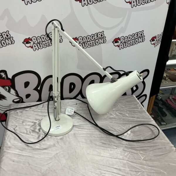 White adjustable desk lamp for reading and task lighting.