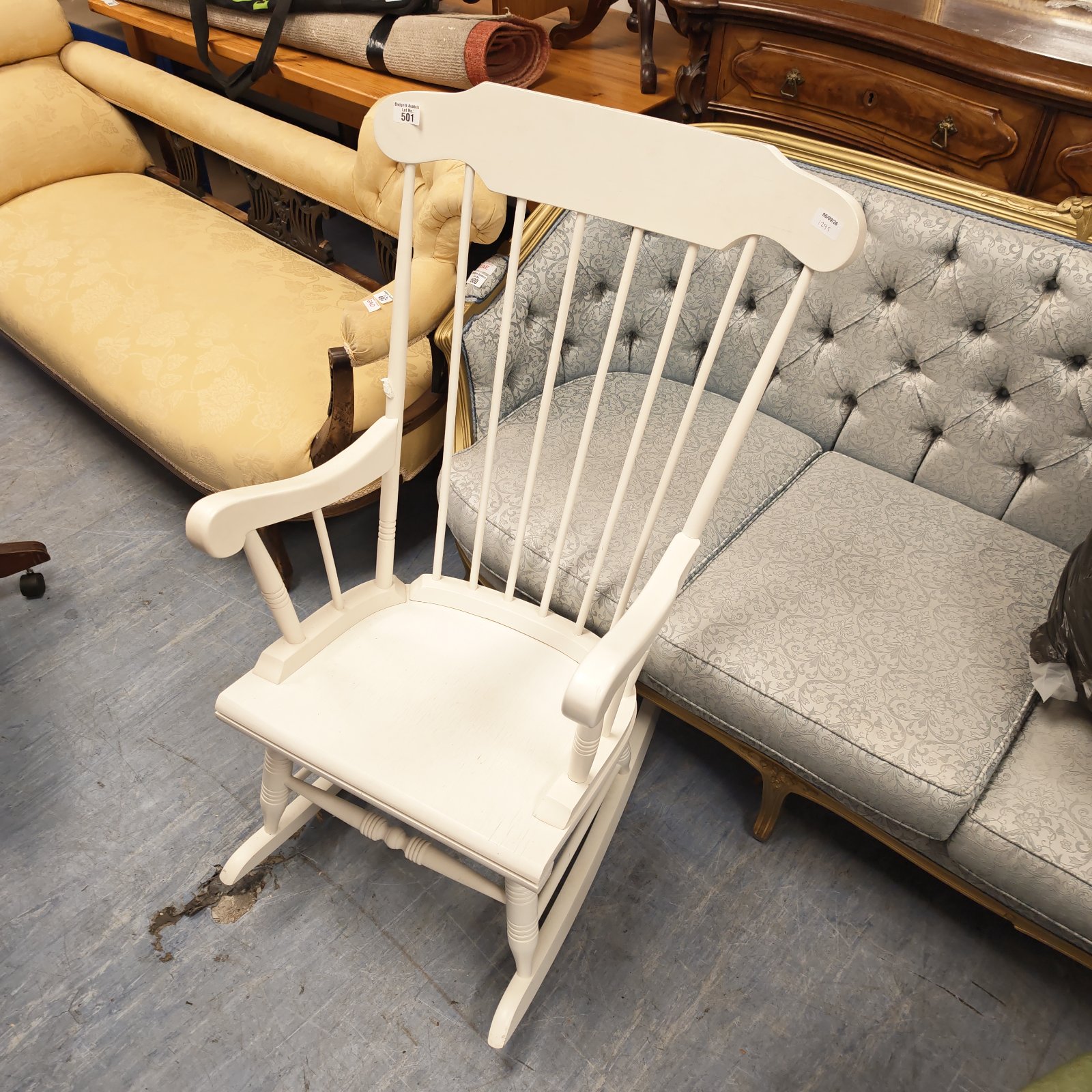 White painted rocking chair in farmhouse style.