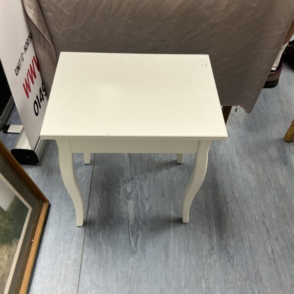 Small white vintage side table with a drawer.
