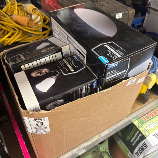 Stack of vintage Wickes lighting boxes, new old stock.