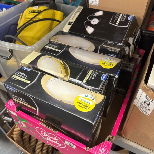 Wickes lighting lot with various downlights and ceiling fixtures in packaging.