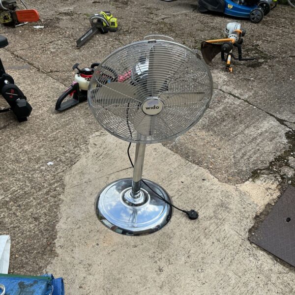 Vintage Wido fan with chrome base and white guard.