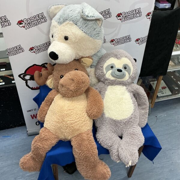 Large wolf, sloth, and moose soft toy animals collection.
