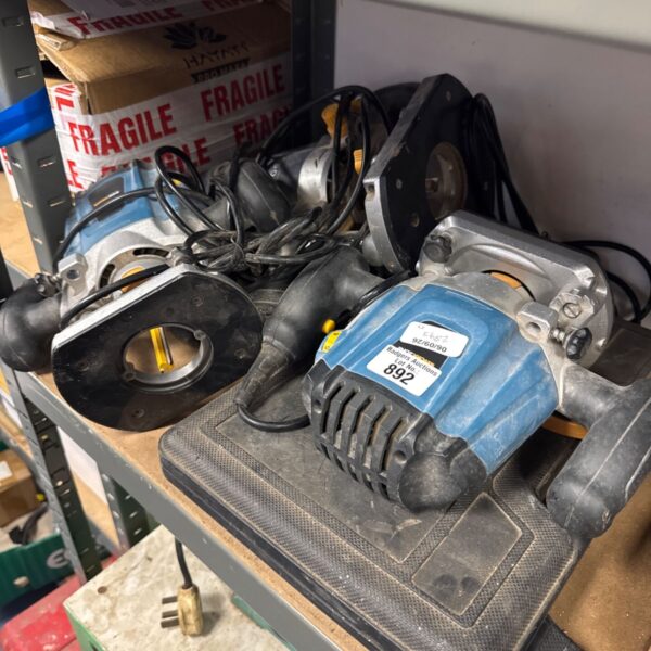 Used Workzone router with included router bit set for woodworking.