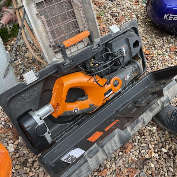 Worx reciprocating saw inside its original carrying case.