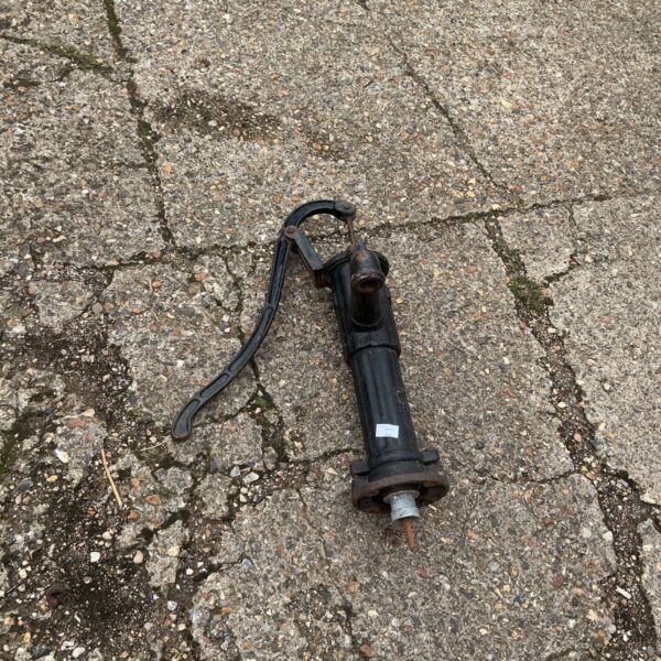 Antique wrought iron garden pump for garden decoration.