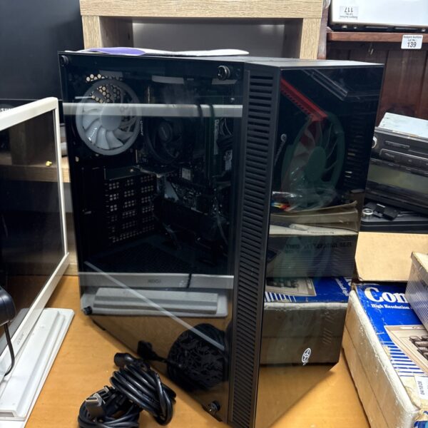 XUM Titan Gaming PC front view with RGB lighting.