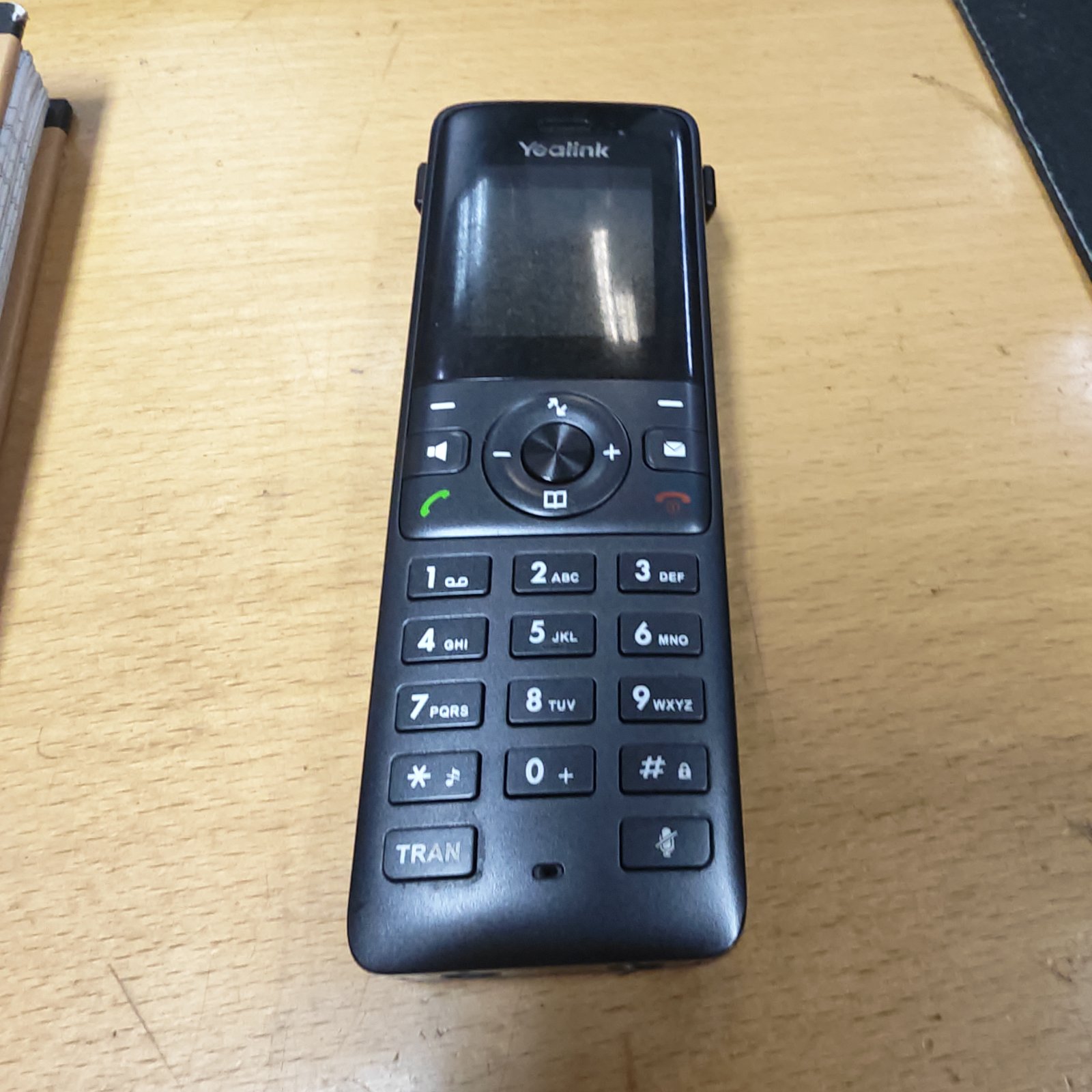 Front view of a vintage Yealink mobile telephone.