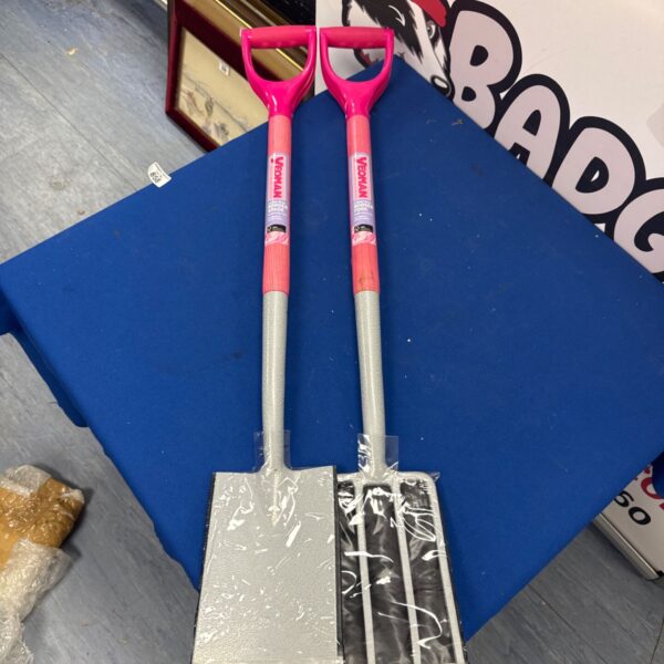 New Yeoman carbon steel garden fork and spade with pink handles.