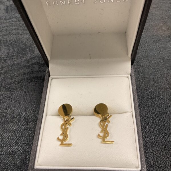 Vintage Yves Saint Laurent monogram earrings in original box.