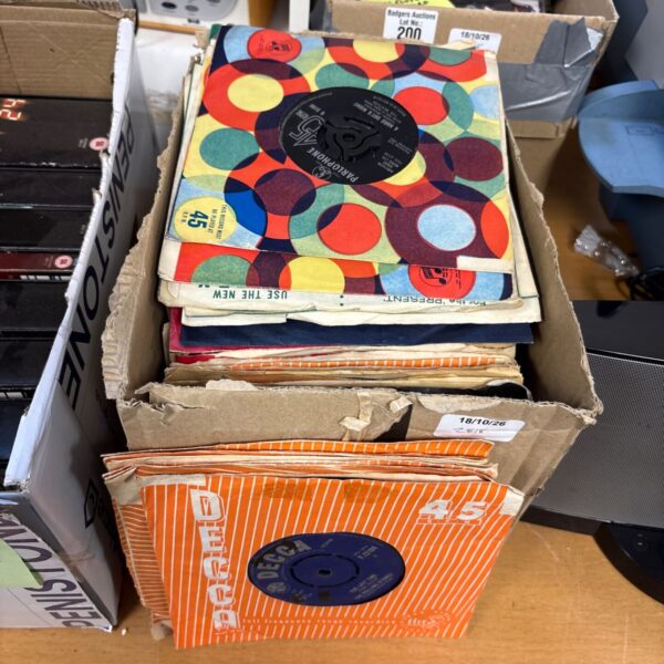 1960s vinyl singles collection including Rolling Stones and Beatles records.