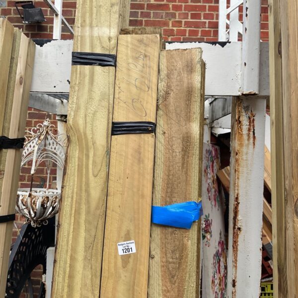 Three bundles of 6'6" timber strapped with black and blue tape