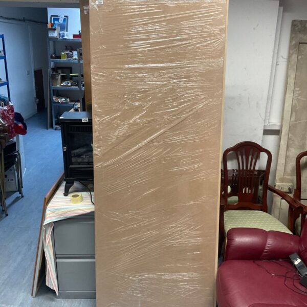 Large 78x30 inch hardboard panel wrapped in clear plastic film