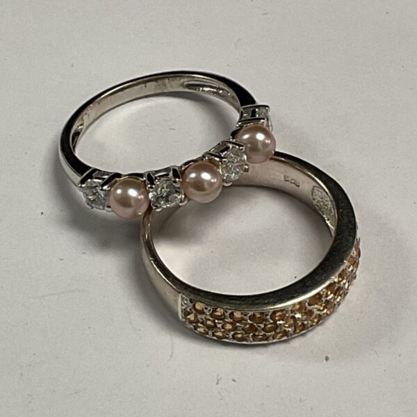 Two 925 silver rings, one with seed pearls and one with gold CZ stones