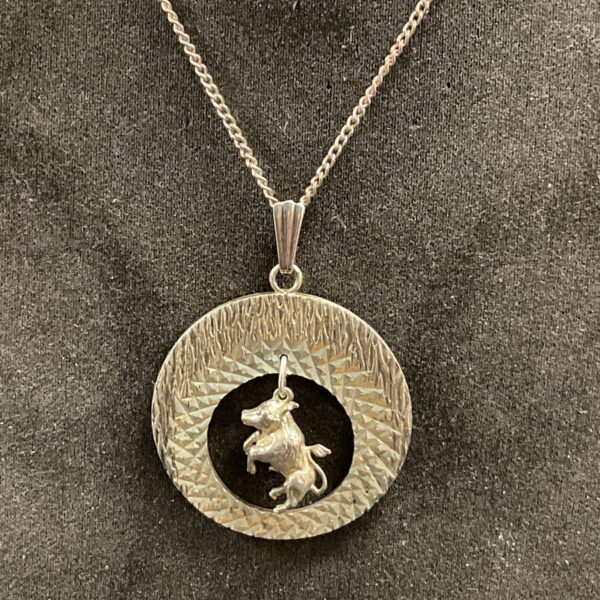 925 silver Taurus zodiac pendant necklace with textured round pendant and bull charm