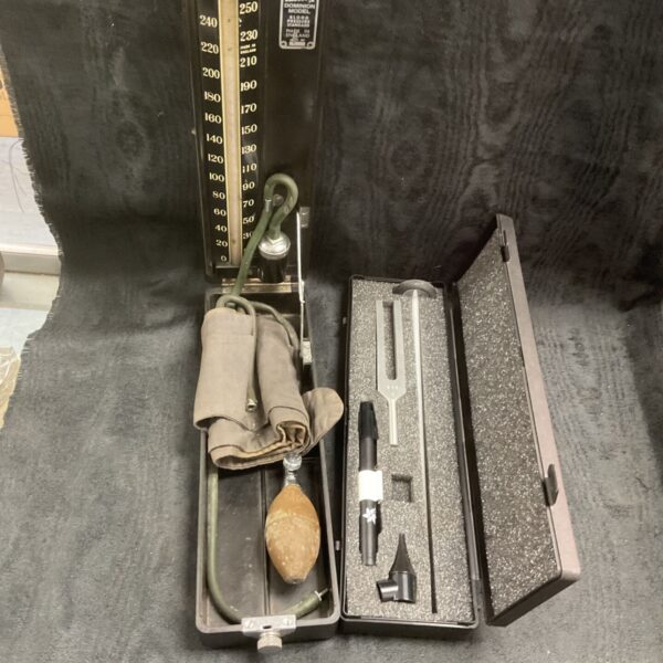 Vintage Accoson Dominion Model blood pressure tester with cuff and bulb in open case