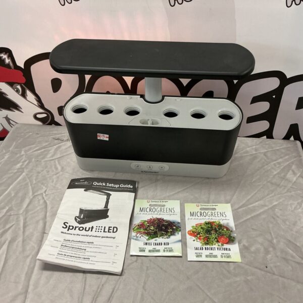 AeroGarden Sprout LED indoor gardening system with light arm and seed packets