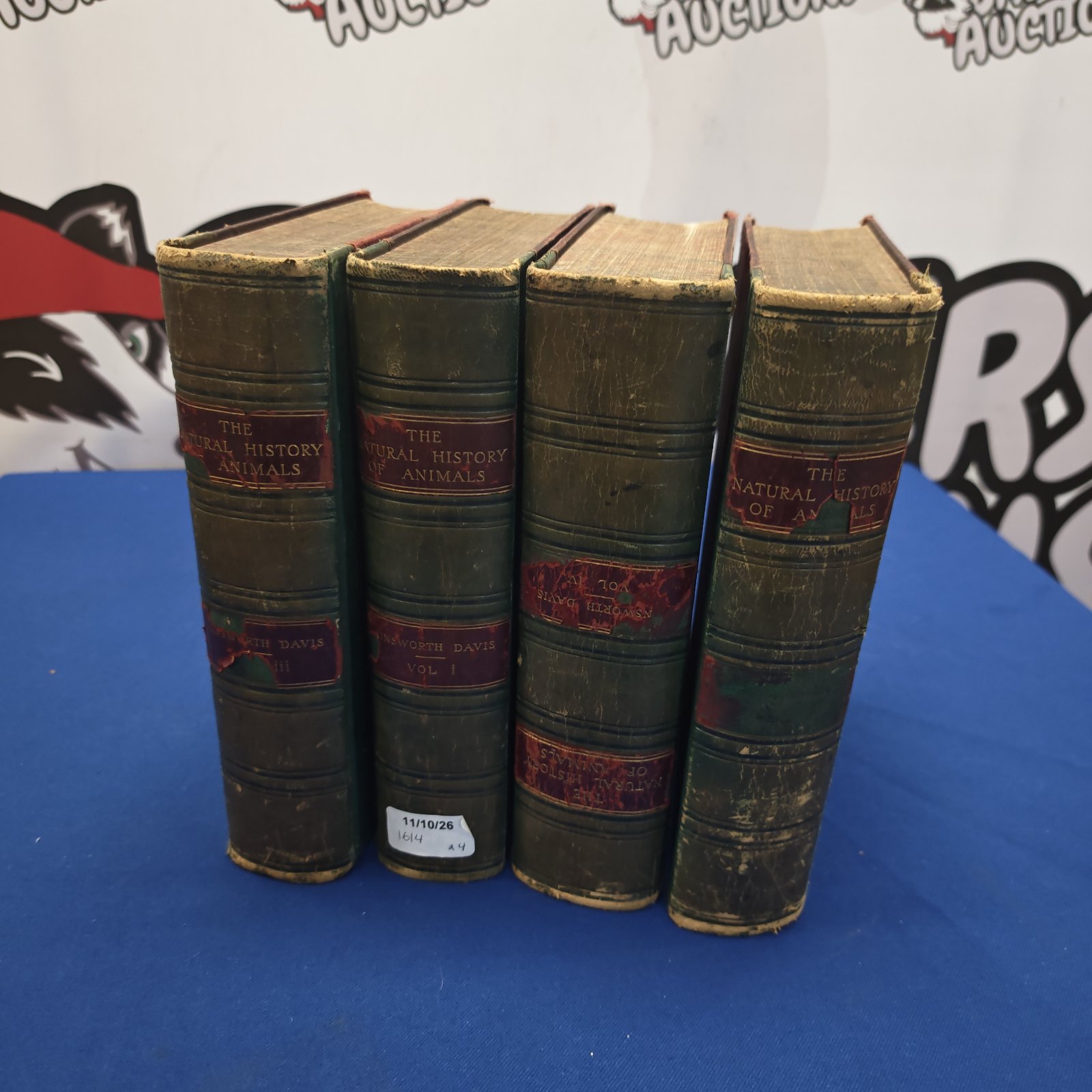 Vintage Ainsworth Davis natural history books stacked together.