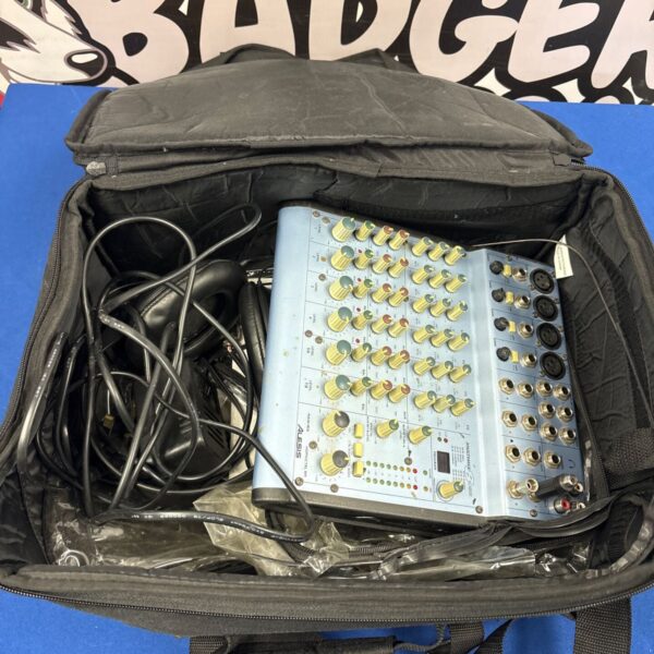 Alesis MultiMix 8 analog audio mixer in open black carry bag with cables